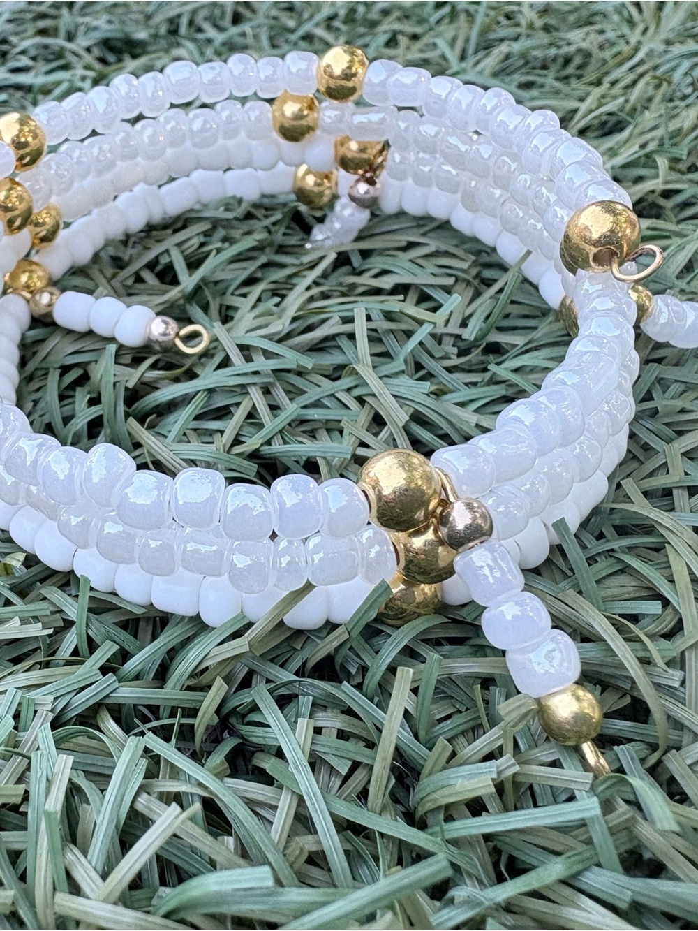White Beaded Coil Bracelet with Gold Accents